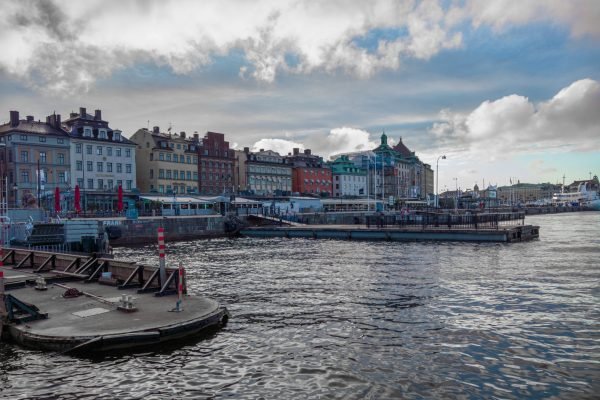 A beautiful shot of colorful buildings on the edge of the sea