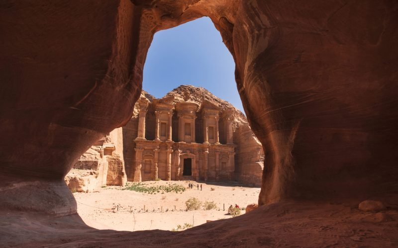 cave and monastery ad - dier  in the desert mountains of Jordan in the ancient city of Petra