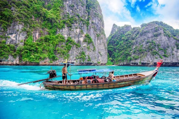 KRABI - DECEMBER 1: Long boat and tourist at Maya bay in Phi Phi Island. Photo taken on December 1 2016 in Krabi, Thailand.