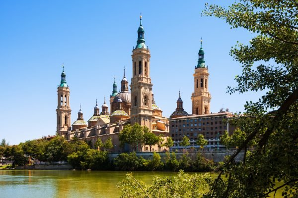 Summer view of of Cathedral in Zaragoza from river. Aragon, Spain